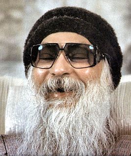 Osho laughing